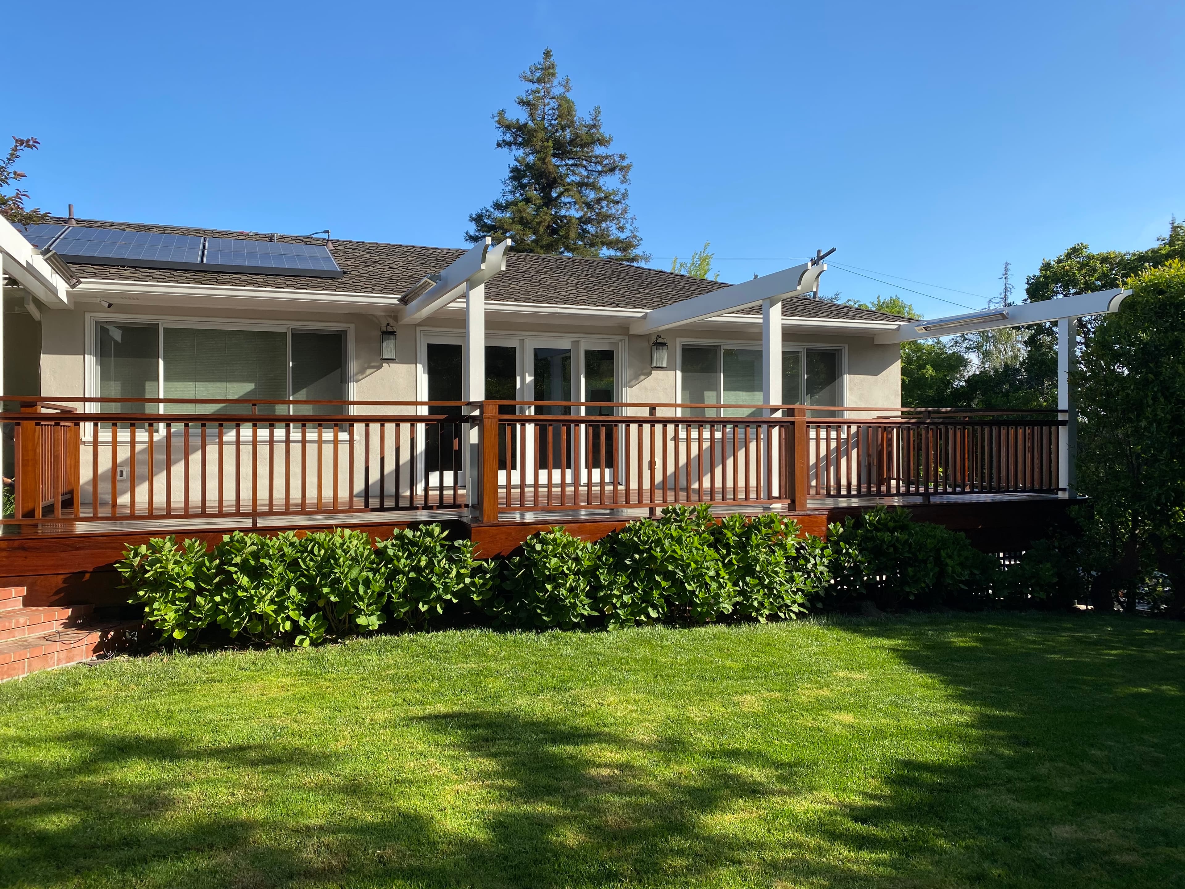 Custom deck with pergola and outdoor living space